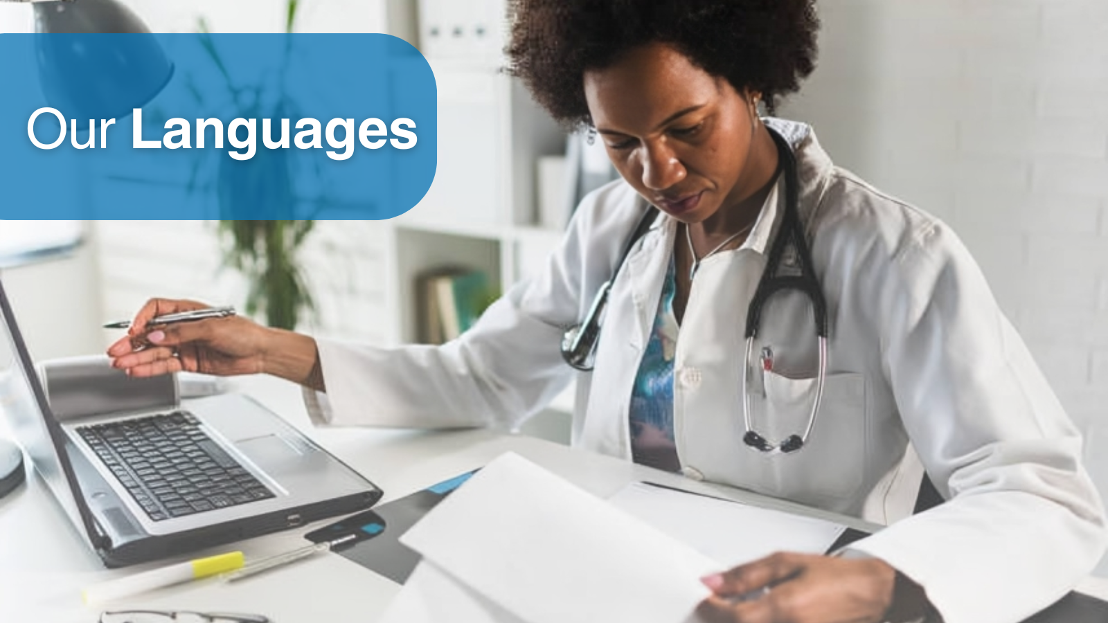 A female doctor at a desk with a laptop, working on Healthcare Translations, accompanied by the text "Our Languages" displayed prominently.